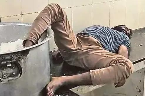 Watchman Caught Sleeping With Foot in Rice at Telangana Hostel