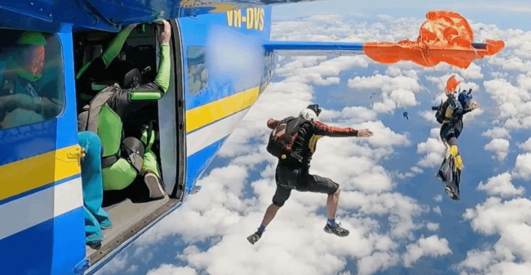 Terrifying Mid-Air Drama: Skydiver Hangs from Plane Tail After Parachute Gets Stuck!