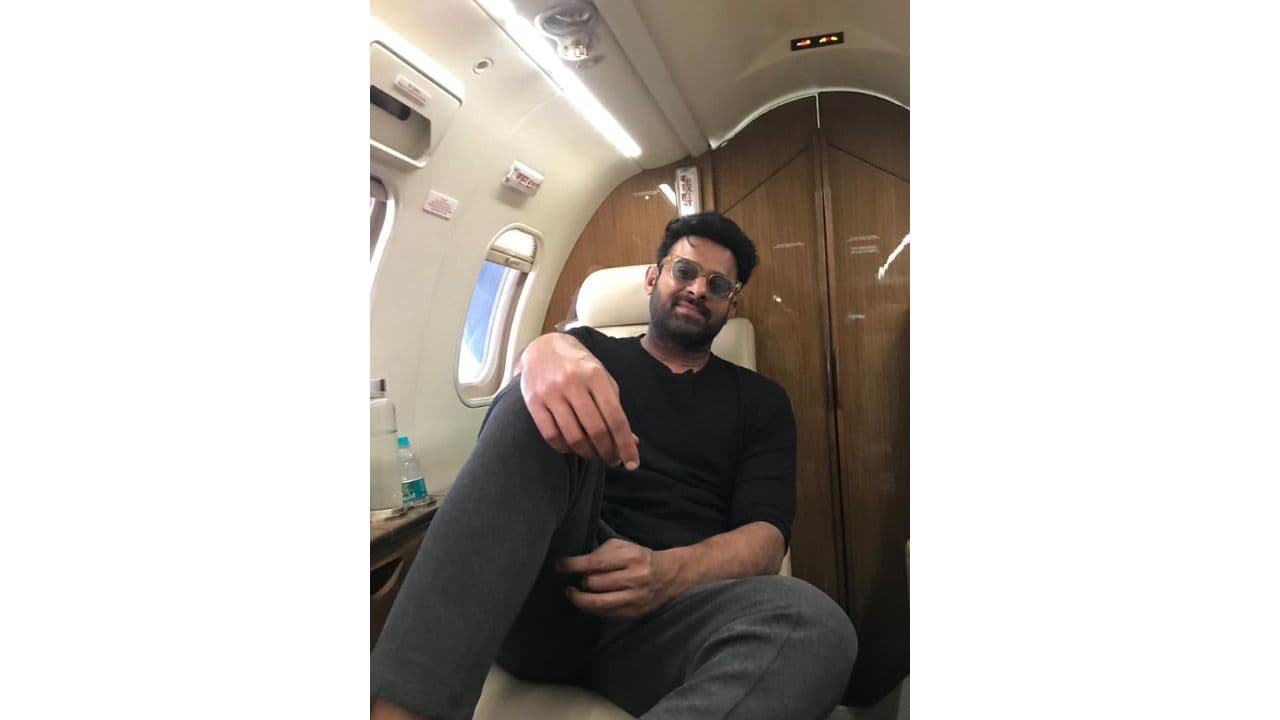 Prabhas Journey in Private Jets - Careful Steps to Avoid New Movie Look Leaks